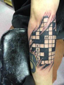 a crossword tattoo